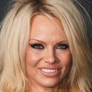 Pamela Anderson - Age, Family, Bio | Famous Birthdays