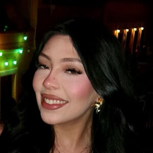 Abril Musso Headshot 3 of 3