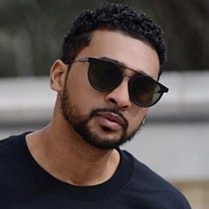 Adam Ali Headshot 4 of 10
