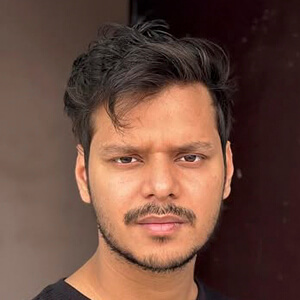 Alpha Akki Headshot 4 of 7