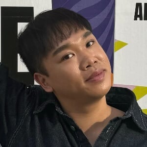 Minh Tang Headshot 2 of 2