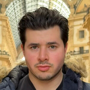 Carlos Torres Headshot 2 of 3