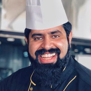 Chef Aziz Headshot 2 of 6