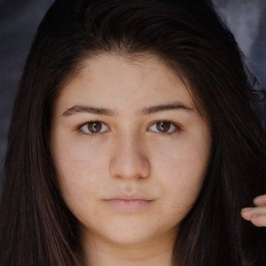 Cris Caceres Headshot 9 of 10