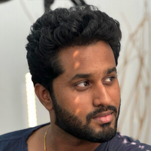 Eniyan Shanmugavel Headshot 5 of 6