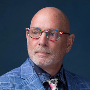 Greg S. Reid Headshot 3 of 4