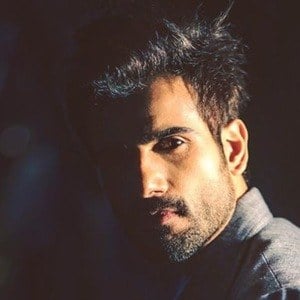 Karan Tacker Headshot 6 of 7