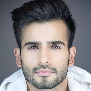 Karan Tacker Headshot 7 of 7