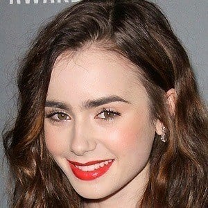 Lily Collins - Age, Family, Bio | Famous Birthdays