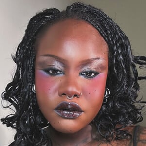 Naomi Waku Headshot 5 of 5
