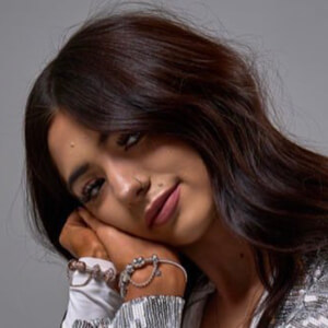 Olivia Owassa Headshot 7 of 7