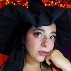 Peachy Sama Headshot 3 of 4