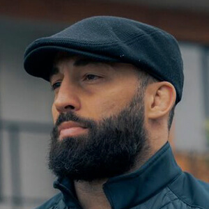 Roman Dolidze Headshot 3 of 6