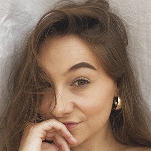 Romane Headshot 9 of 10