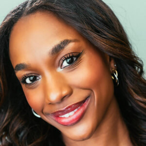 Sage Thomas Headshot 4 of 7