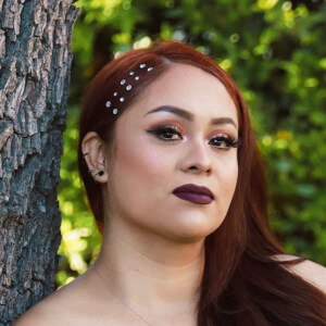 Yanny Love Headshot 3 of 3