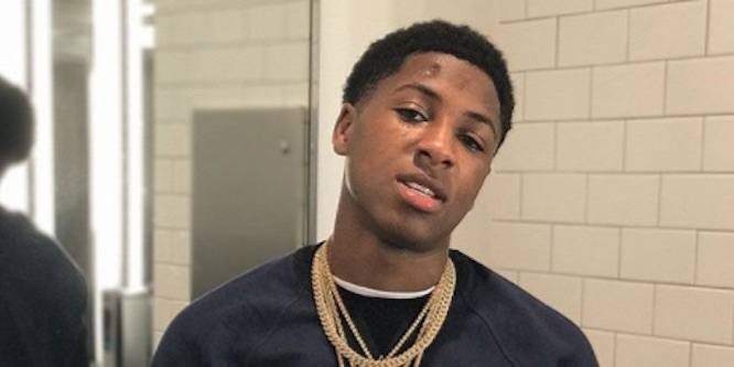 At what age did NBA Youngboy have his first child?