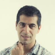Journalists born in Iran