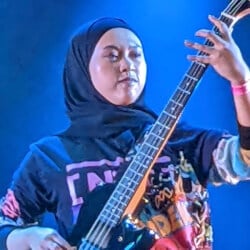 Bassists born in Indonesia